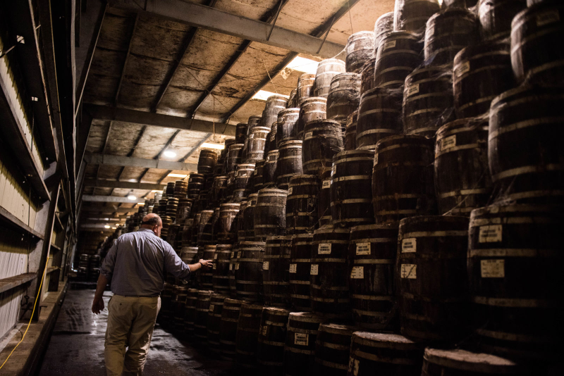 Osborn points to the thousands of wooden casks of aging Tabasco mash.